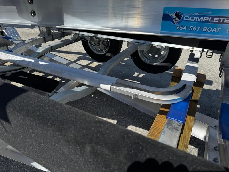 Slide: The Image of 2025 Trailer 17-30 with dual wheels and sturdy frame, parked on asphalt. - 15
