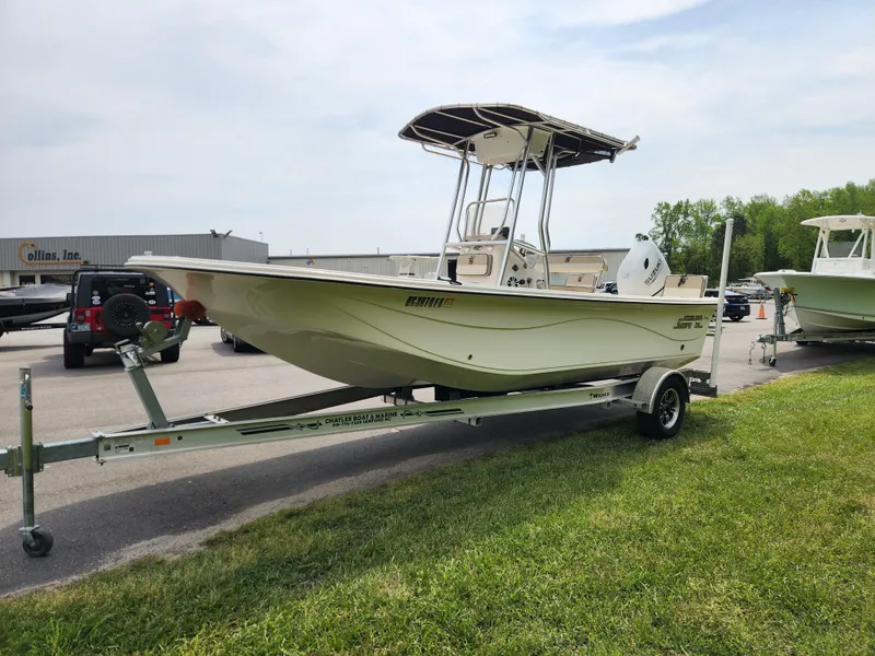 Slide: The Image of 2023 Carolina Skiff 21 LS boat on trailer, parked outdoors. - 6