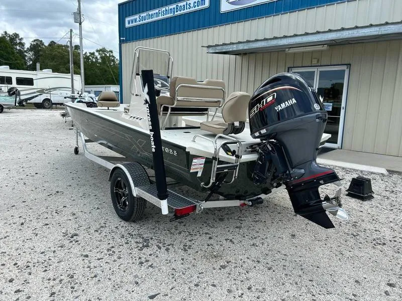 Slide: The Image of 2025 Xpress H20 BAY boat with Yamaha engine, parked outside Southern Fishing Boats dealership. - 12