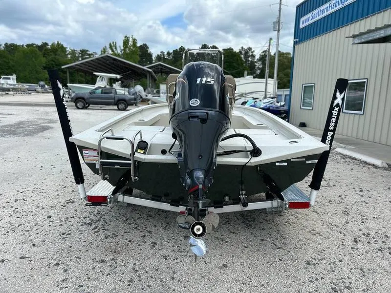Slide: The Image of 2025 Xpress H20 BAY boat with 115 horsepower engine, parked outdoors. - 3