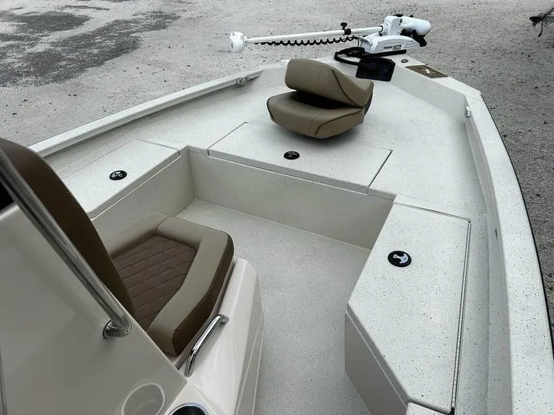 Slide: The Image of 2025 Xpress H20 BAY boat interior with seating and trolling motor. - 7