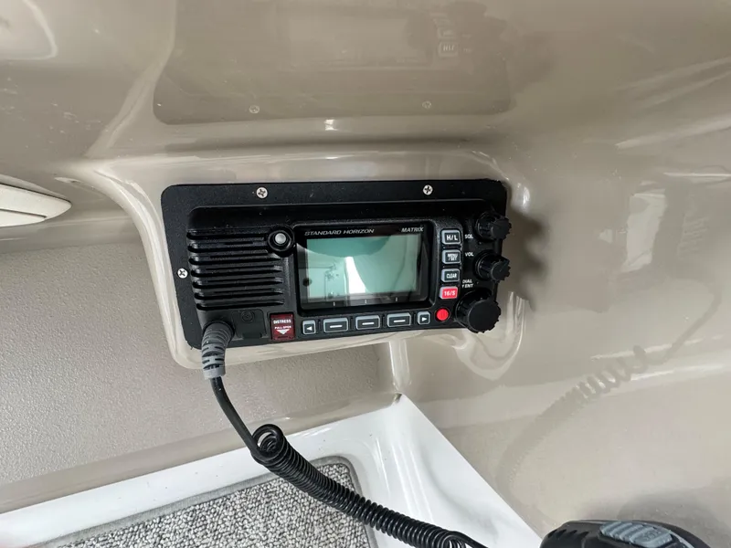 Slide: The Image of VHF radio system on 2005 Larson 370 Cabrio boat dashboard. - 12