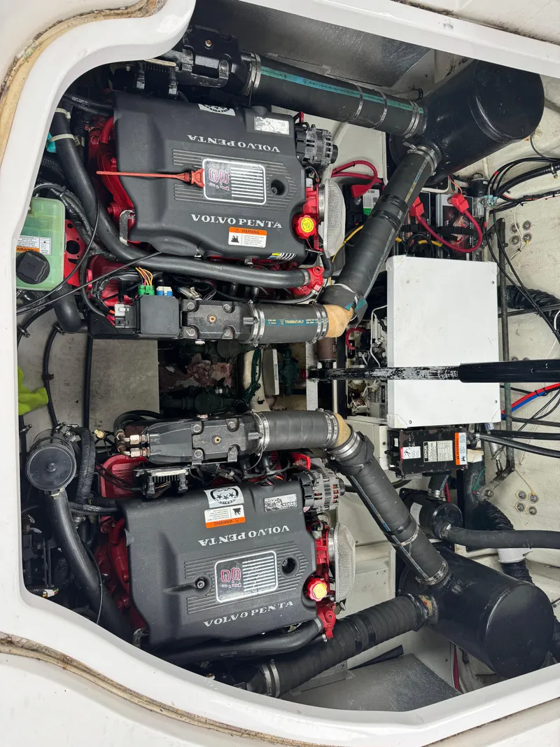Slide: The Image of Engine compartment of a 2005 Larson 370 Cabrio with dual Volvo Penta engines. - 13