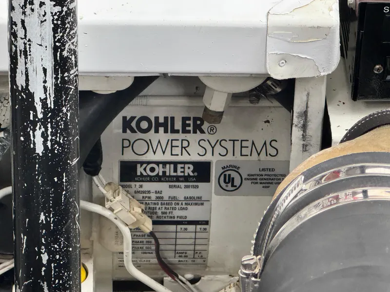Slide: The Image of Kohler Power Systems generator in a 2005 Larson 370 Cabrio boat. - 14