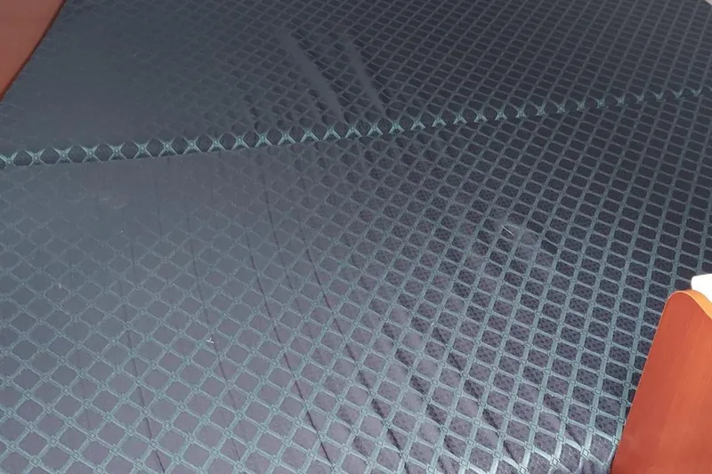 Slide: The Image of Dark patterned fabric on a Beneteau 331 boat interior, 2002 model. - 49