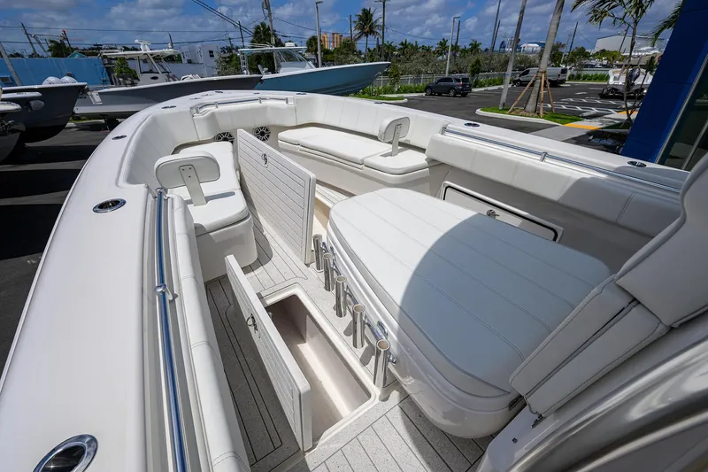 Slide: The Image of 2022 Contender 35 ST boat interior with seating and storage compartments. - 28