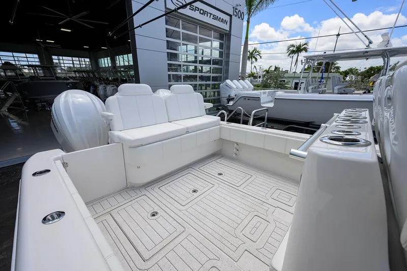 Slide: The Image of 2022 Contender 35 ST boat interior with white seating and spacious deck. - 37