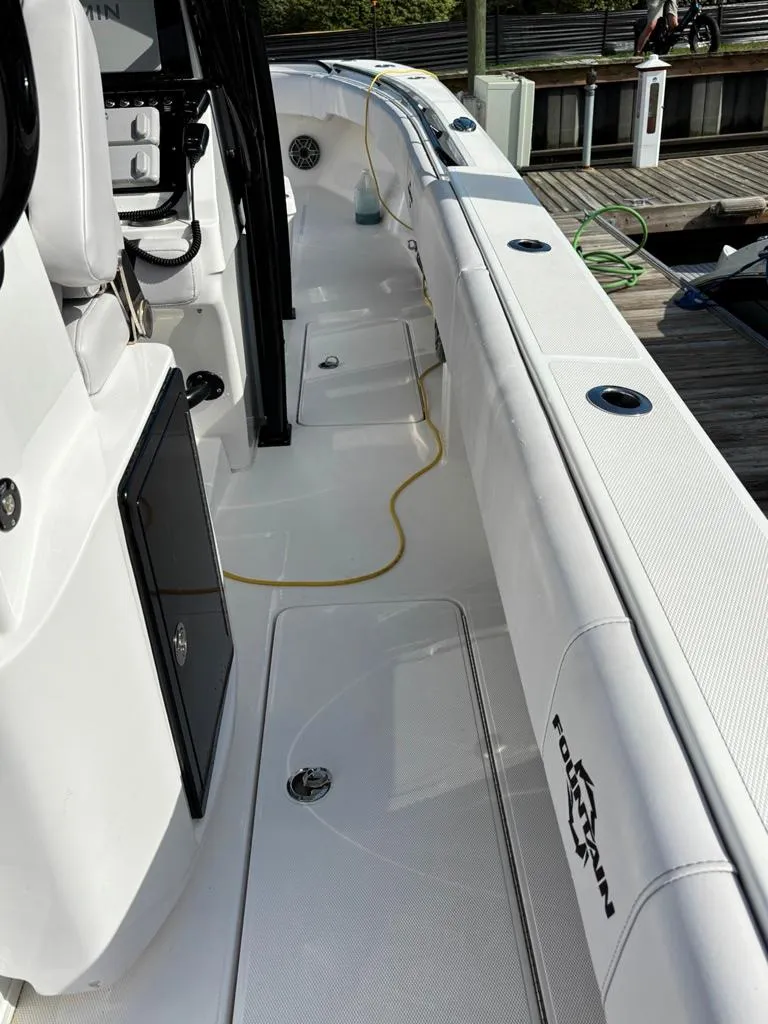 Slide: The Image of 2024 Fountain 34 TE boat deck with sleek design and modern features. - 6
