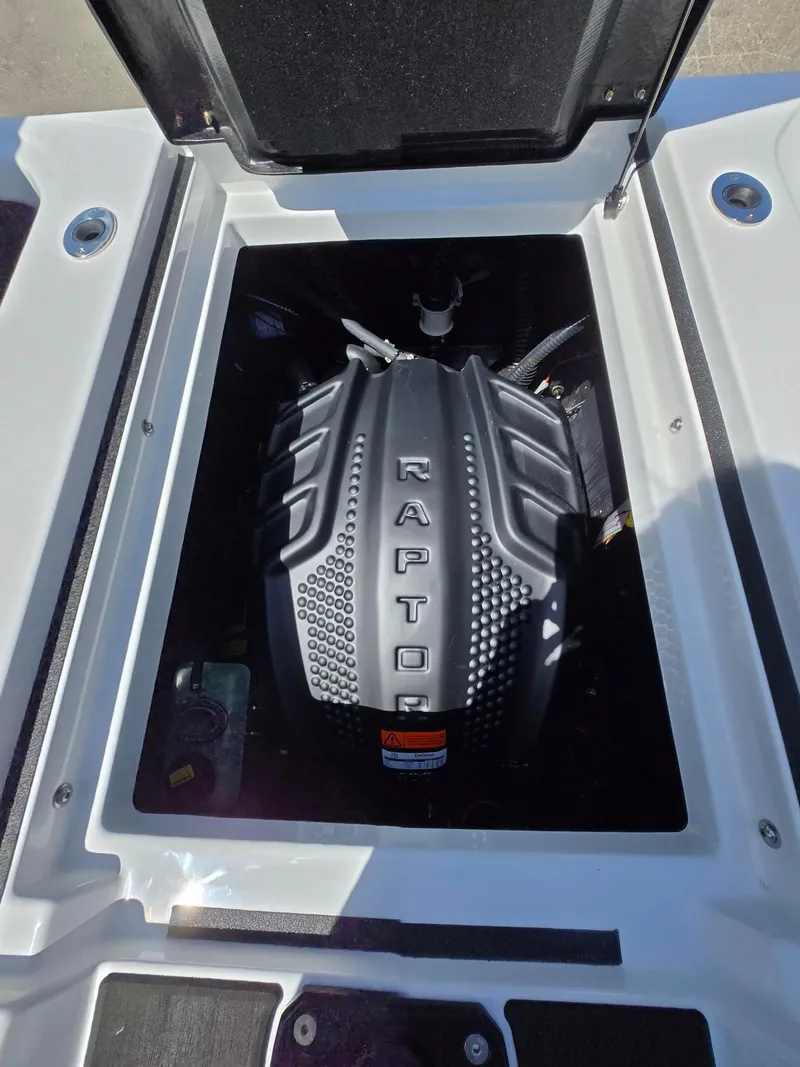 Slide: The Image of 2025 Moomba Craz boat engine compartment featuring a Raptor engine. - 13