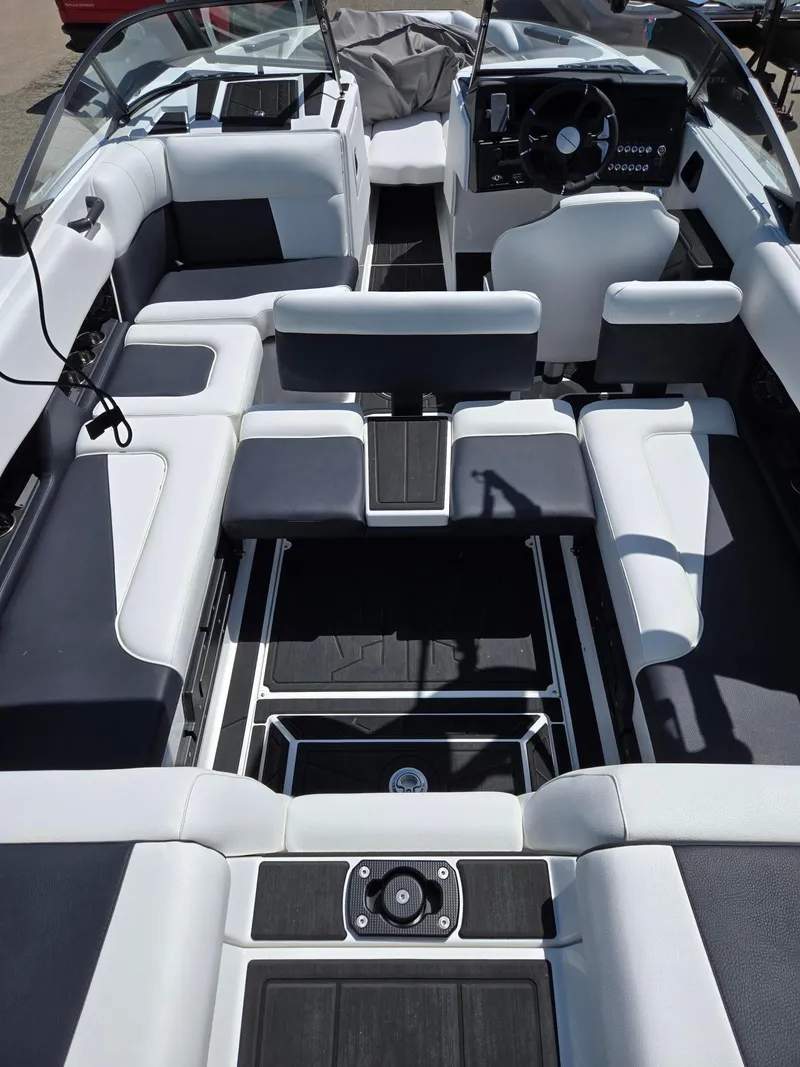 Slide: The Image of 2025 Moomba Craz boat interior with modern seating and sleek design. - 17