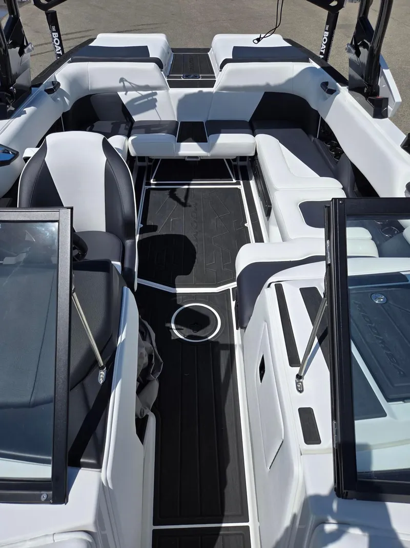 Slide: The Image of 2025 Moomba Craz boat interior with sleek seating and modern design. - 6