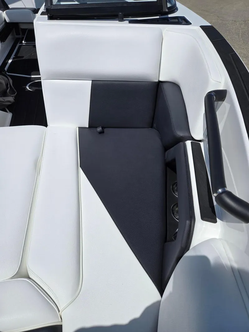 Slide: The Image of 2025 Moomba Craz boat interior with black and white seating design. - 8