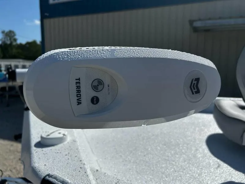 Slide: The Image of Close-up of a 2025 Xpress H20B boat's Terrova trolling motor in sunlight. - 14