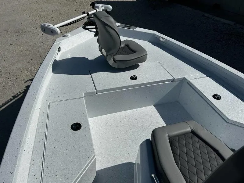 Slide: The Image of 2025 Xpress H20B boat interior with seating and storage compartments. - 15