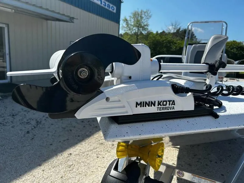Slide: The Image of Minn Kota Terrova motor on 2025 Xpress H20B boat, outdoor setting. - 9