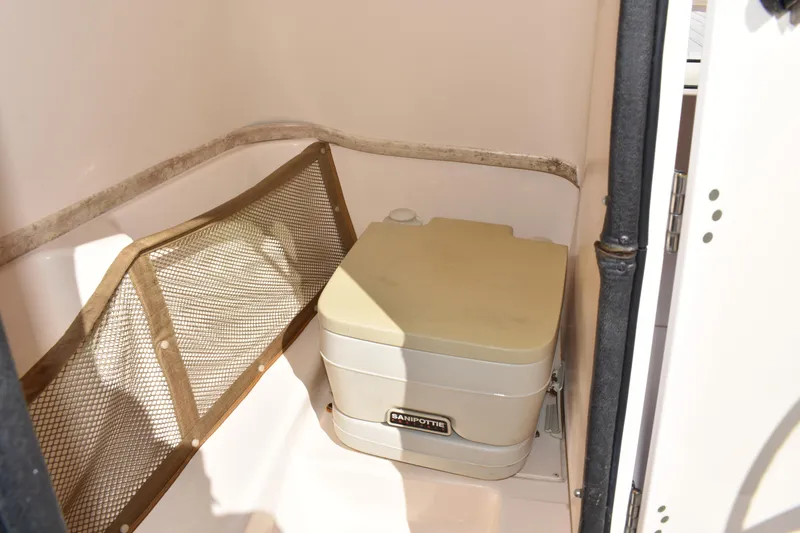 Slide: The Image of Portable toilet in 2005 Grady-White 205 boat cabin. - 9