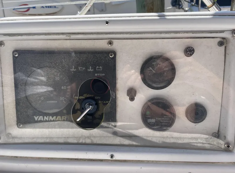 Slide: The Image of Control panel of a 2004 Hunter 36 sailboat with Yanmar engine gauges. - 12
