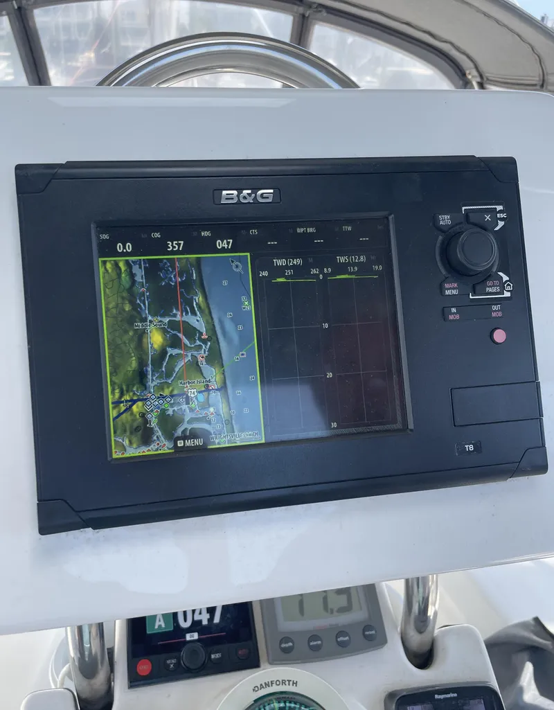 Slide: The Image of B&G navigation system on a 2004 Hunter 36 sailboat dashboard. - 14