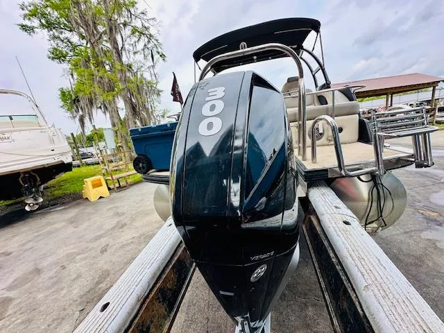 Slide: The Image of 2019 Harris 270 Grand Mariner pontoon boat with powerful 300 horsepower engine. - 18