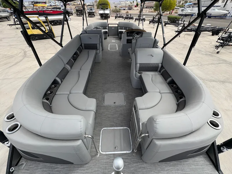 Slide: The Image of 2021 Bennington 25 LFBC pontoon boat with spacious seating and modern design. - 5