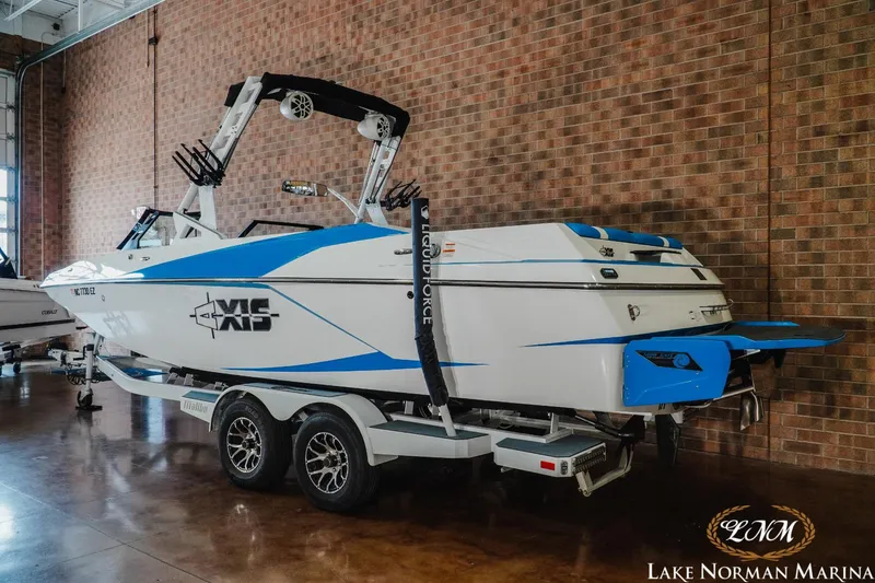 Slide: The Image of 2019 Axis A24 boat on trailer at Lake Norman Marina showroom. - 3