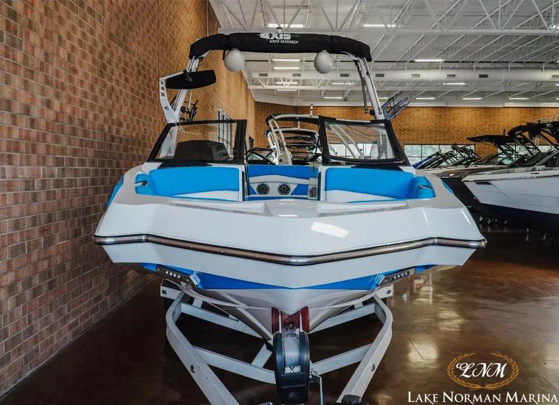Slide: The Image of 2019 Axis A24 boat displayed at Lake Norman Marina showroom. - 4
