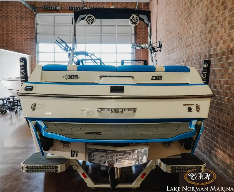 Slide: The Image of 2019 Axis A24 boat in showroom at Lake Norman Marina. - 5