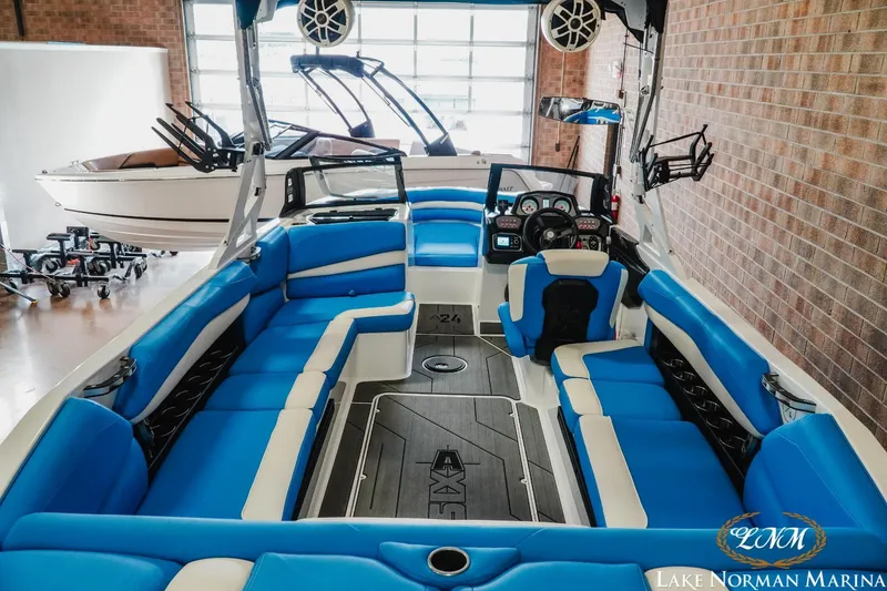Slide: The Image of 2019 Axis A24 boat interior with blue seating at Lake Norman Marina. - 7