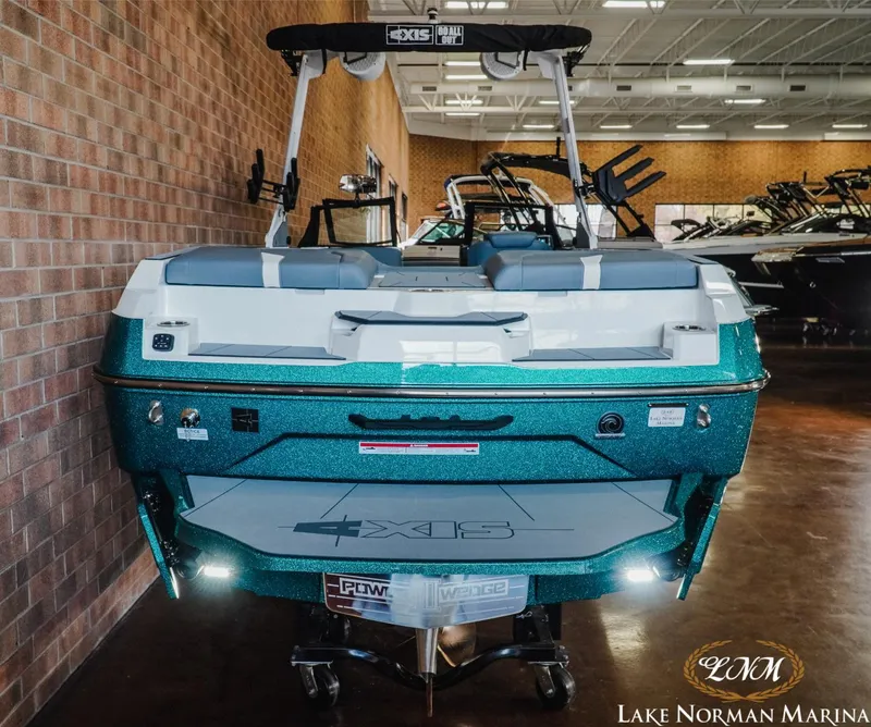 Slide: The Image of 2024 Axis A245 boat in showroom at Lake Norman Marina. - 5