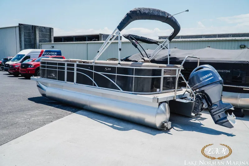Slide: The Image of 2024 Bennington 20SSR pontoon boat with Yamaha engine at Lake Norman Marina. - 2