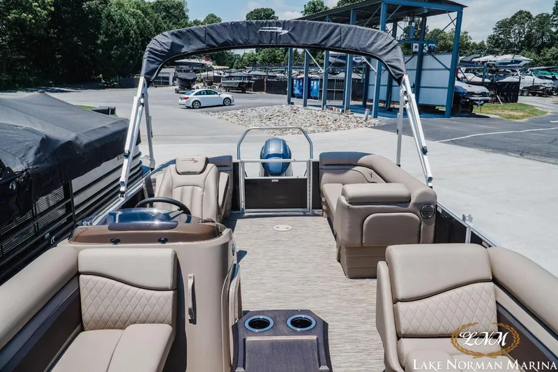 Slide: The Image of 2024 Bennington 20SSR pontoon boat with luxurious seating at Lake Norman Marina. - 7