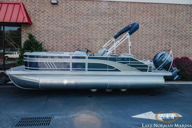 Slide: The Image of 2025 Bennington 22LSB pontoon boat parked at Lake Norman Marina. - 1