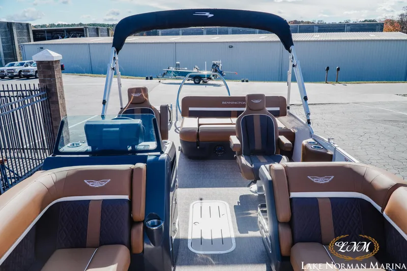 Slide: The Image of 2025 Bennington 22MSB pontoon boat with luxurious seating at Lake Norman Marina. - 9