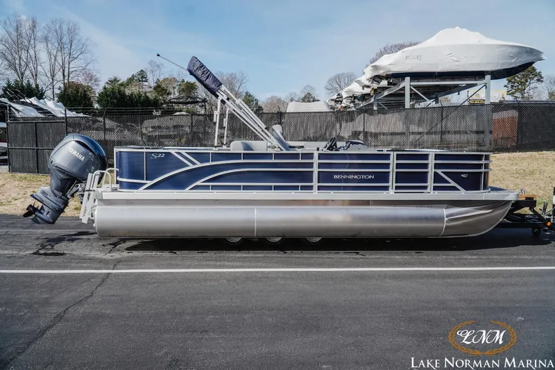 Slide: The Image of 2024 Bennington 22SF-SPS pontoon boat with Yamaha motor at Lake Norman Marina. - 1