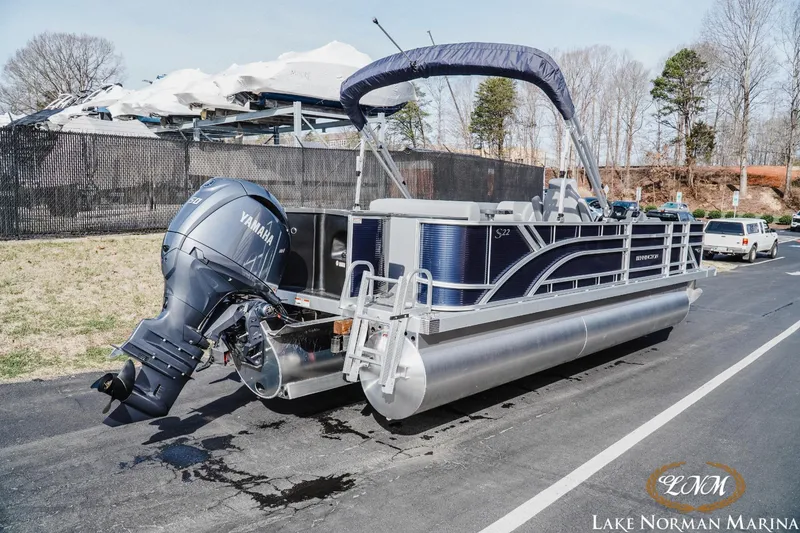 Slide: The Image of 2024 Bennington 22SF-SPS pontoon boat with Yamaha engine at Lake Norman Marina. - 3