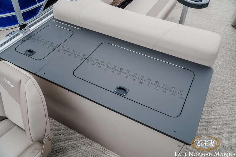 Slide: The Image of 2024 Bennington 22ss-sps boat interior with measuring table and seating at Lake Norman Marina. - 17