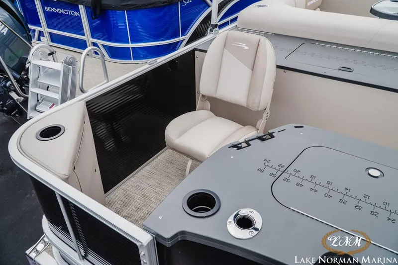 Slide: The Image of 2024 Bennington 22ss-sps boat interior with seating and fishing station at Lake Norman Marina. - 5