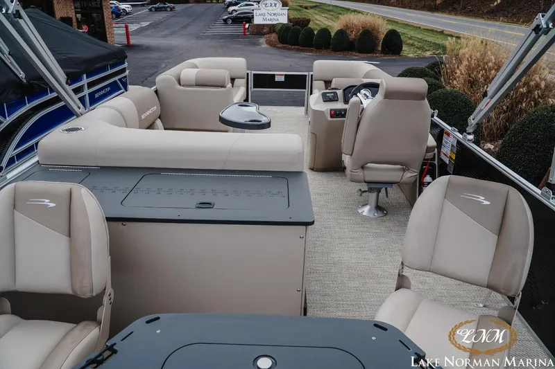 Slide: The Image of 2024 Bennington 22ss-sps pontoon boat interior with beige seating at Lake Norman Marina. - 7