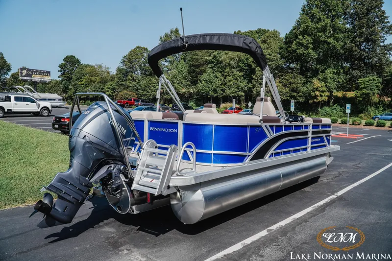 Slide: The Image of 2025 Bennington 22SSR pontoon boat with Yamaha engine at Lake Norman Marina. - 3