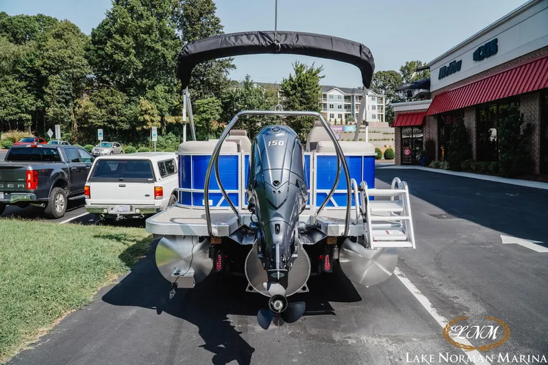 Slide: The Image of 2025 Bennington 22SSR pontoon boat with Yamaha 150 engine at Lake Norman Marina. - 4