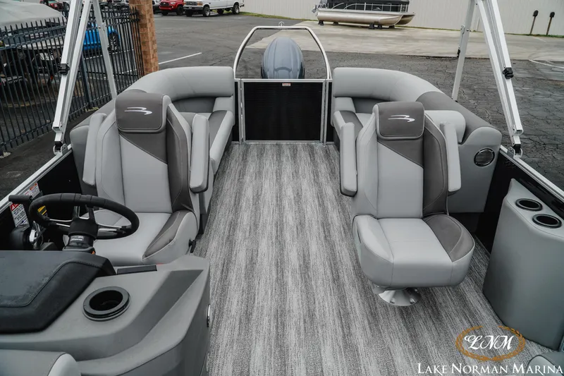 Slide: The Image of 2025 Bennington 22SSR pontoon boat interior with gray seating and modern design. - 15