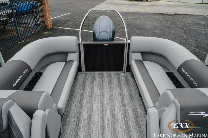 Slide: The Image of 2025 Bennington 22SSR pontoon boat interior with gray seating at Lake Norman Marina. - 16
