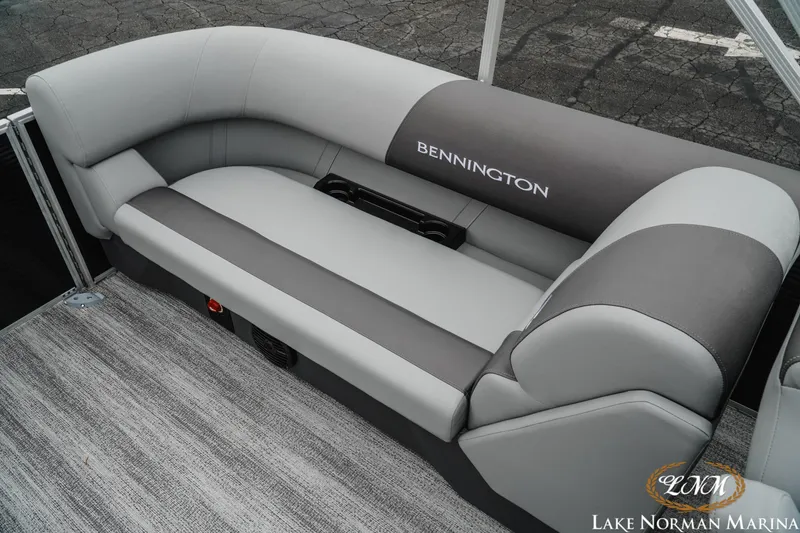 Slide: The Image of 2025 Bennington 22SSR boat seating, gray upholstery, Lake Norman Marina logo. - 18