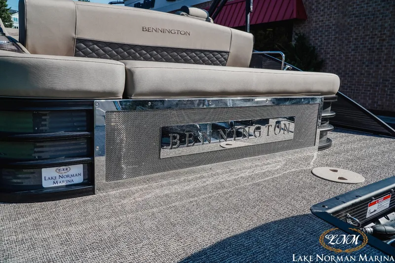 Slide: The Image of 2025 Bennington 23LSB boat at Lake Norman Marina, featuring luxurious seating and sleek design. - 5