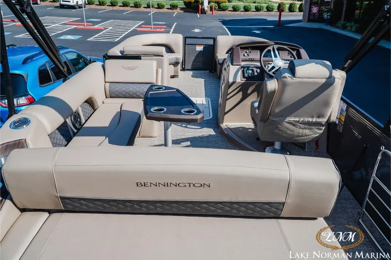 Slide: The Image of 2025 Bennington 23LSB pontoon boat interior with luxurious seating and modern helm. - 6