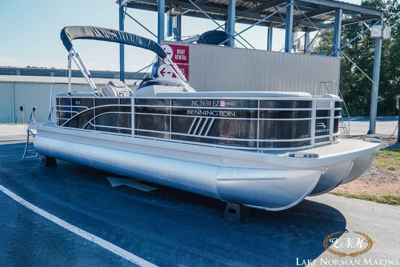 Slide: The Image of 2023 Bennington 23LSR pontoon boat at Lake Norman Marina, available for rental. - 3