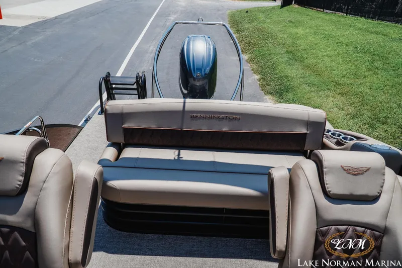 Slide: The Image of 2024 Bennington 23LXSSB boat interior with luxurious seating at Lake Norman Marina. - 14
