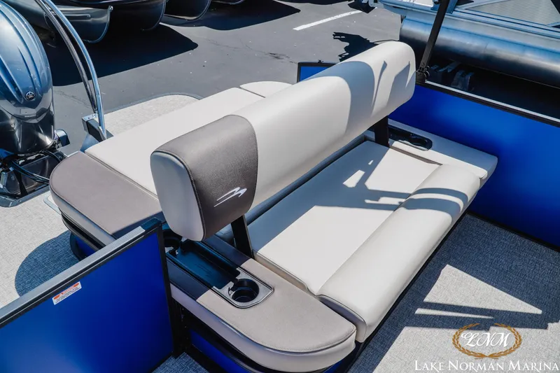 Slide: The Image of 2025 Bennington 23ssb boat seating area with cup holders at Lake Norman Marina. - 15