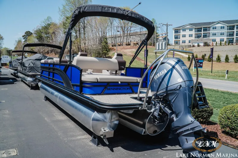 Slide: The Image of 2025 Bennington 23SSB pontoon boat with Yamaha engine at Lake Norman Marina. - 3