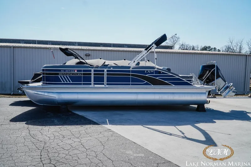 Slide: The Image of 2023 Bennington 24LXSB pontoon boat at Lake Norman Marina. - 1